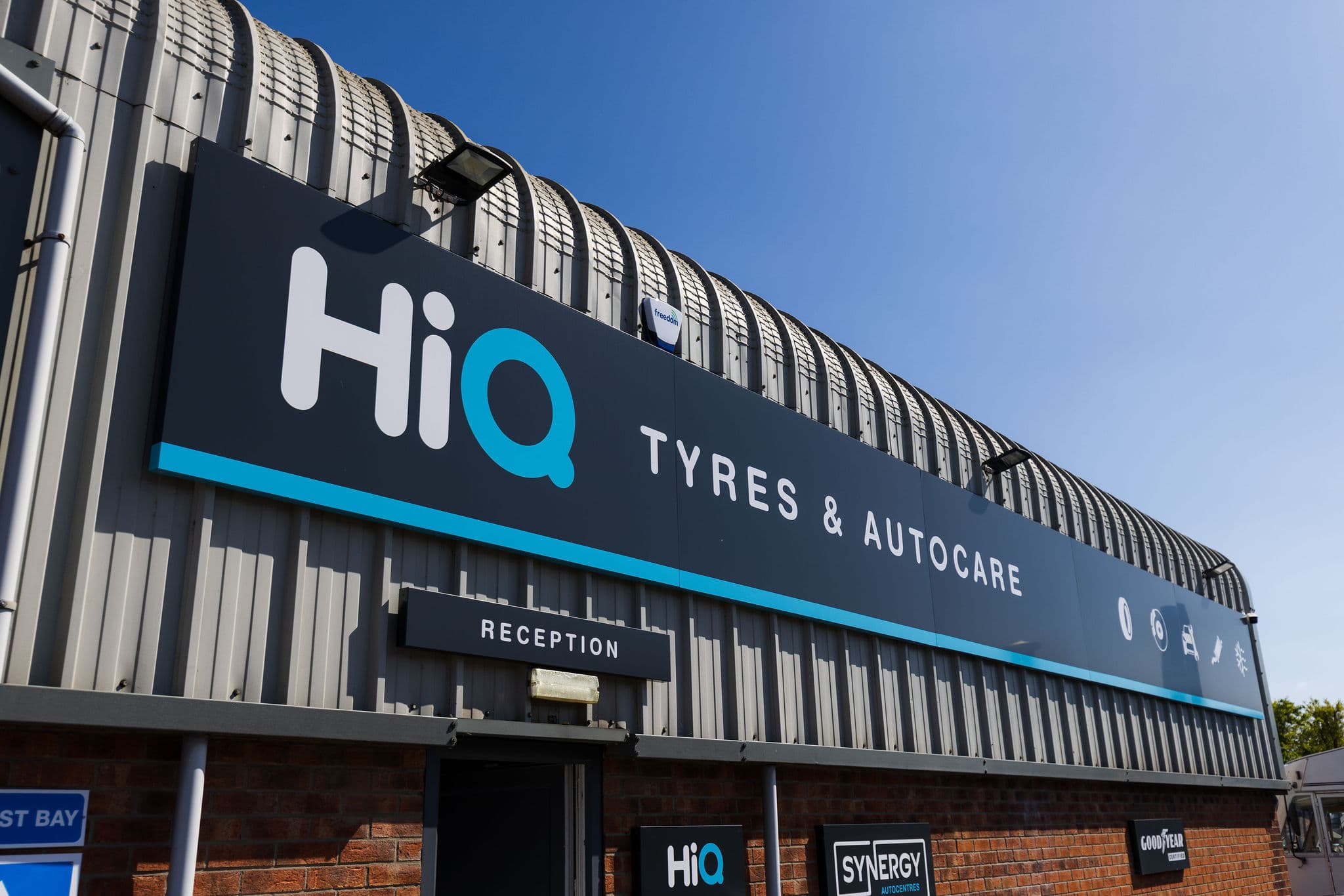 HiQ Tyres & Autocare sign outside Synergy Autocentres